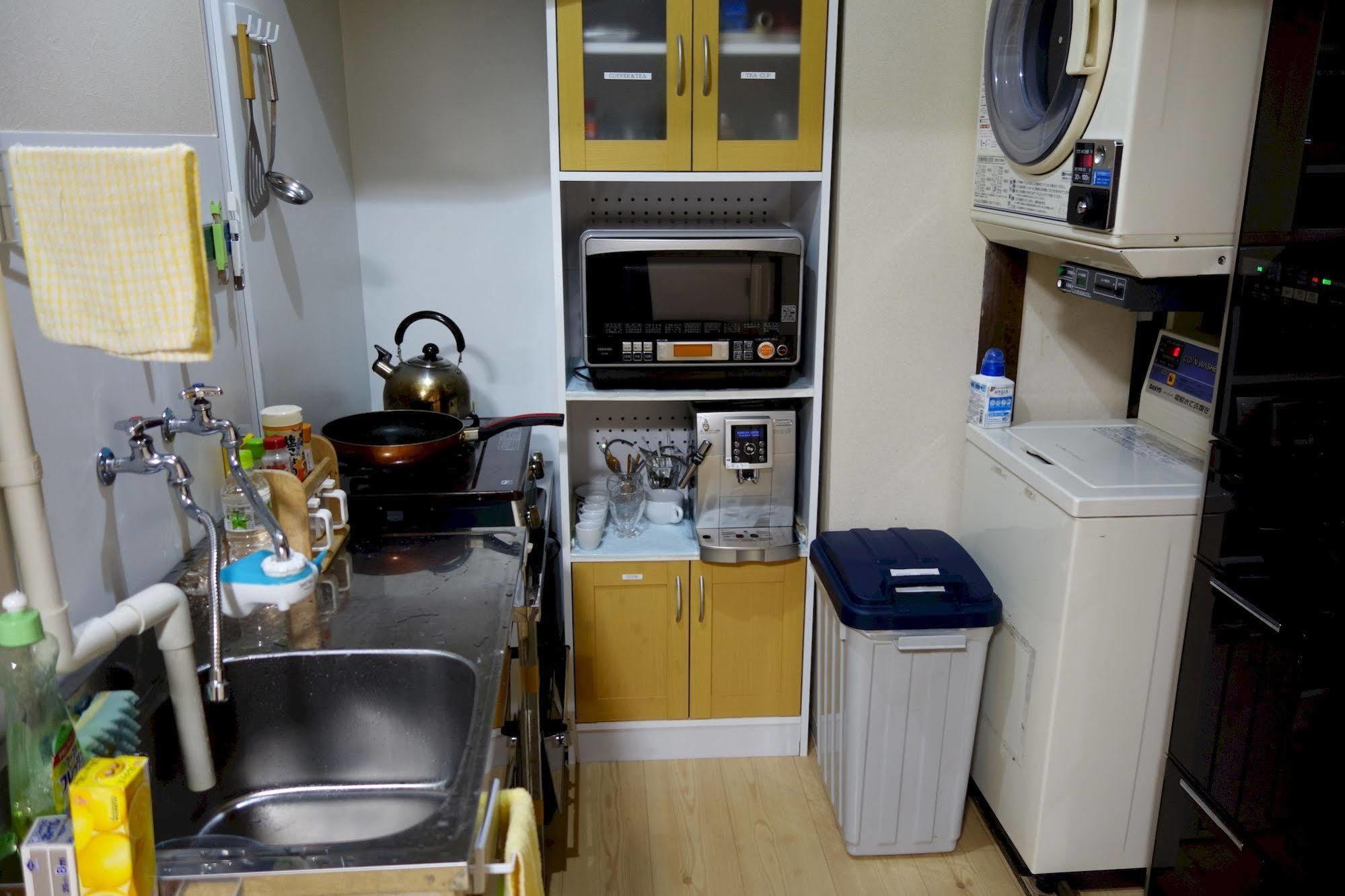 Guesthouse Akicafe Inn Hiroshima Buitenkant foto