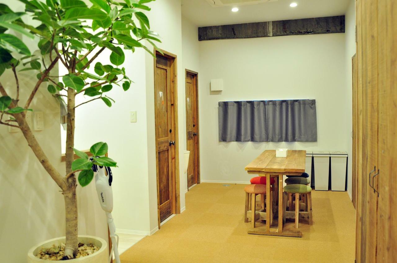 Guesthouse Akicafe Inn Hiroshima Buitenkant foto