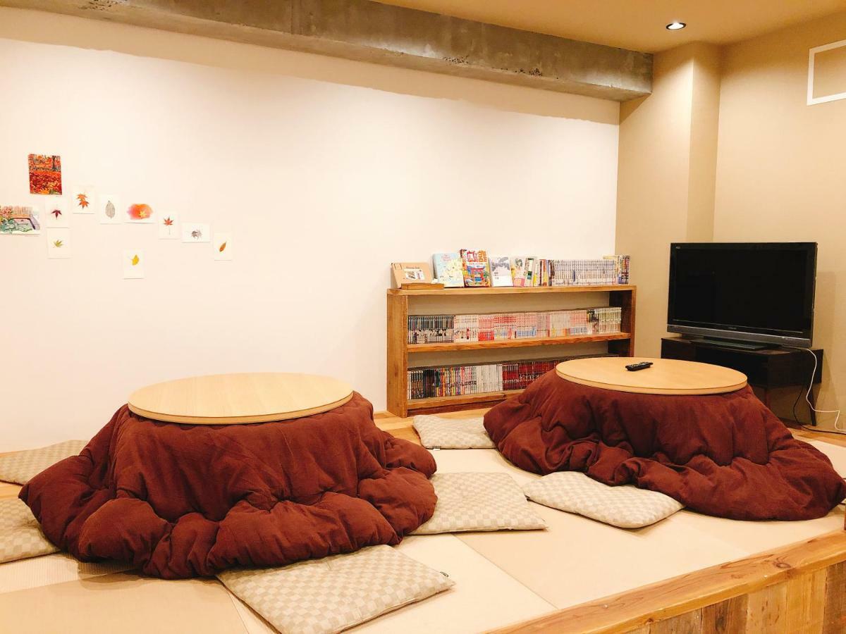 Guesthouse Akicafe Inn Hiroshima Buitenkant foto